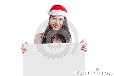 Asian Christmas girl with Santa Claus clothes holding blank sign Stock Photo