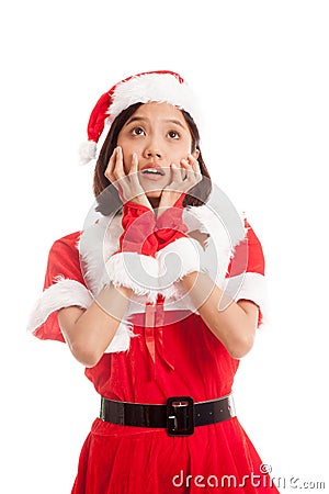 Asian Christmas Santa Claus girl shock and look up Stock Photo