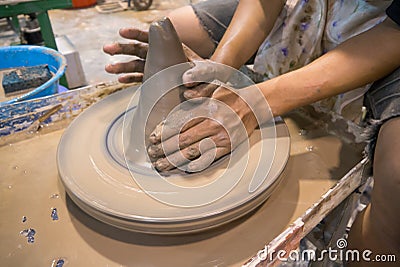 Asian clay potter Stock Photo