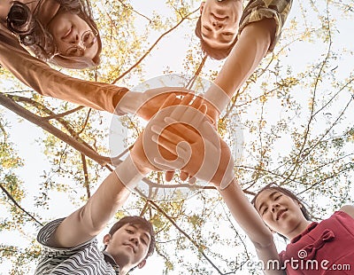 Asian College Teen Students Teamwork Stacking Hand Concept. Stock Photo