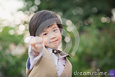 Asian confidence child shows his hand Stock Photo