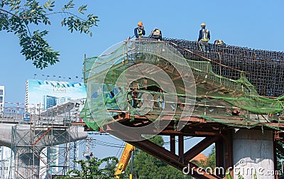 Asian construction work, overhead railway Editorial Stock Photo