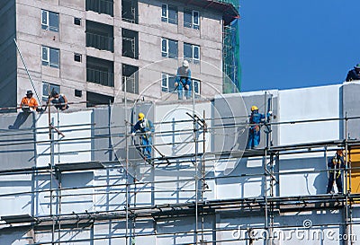 Asian construction worker scraffold, building site Editorial Stock Photo