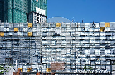 Asian construction worker scraffold, building site Editorial Stock Photo