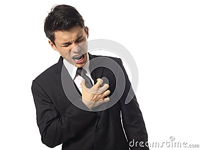 Asian Corporate Man having a Heart Burn Stock Photo