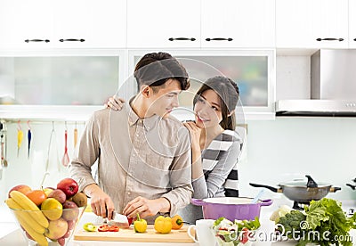 Asian Couple cooking in the kitchen Stock Photo