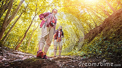 Asian couple hipster hiking on mountain holiday wild adventure in autumn forest park, Helping, Helps, Business sucess and team wor Stock Photo