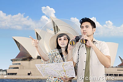 Asian couple using binoculars in Sydney, Australia Editorial Stock Photo