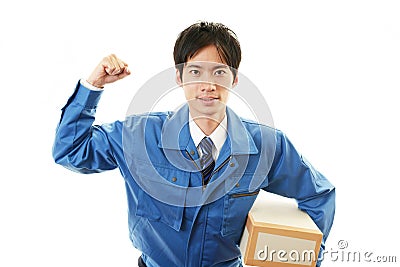 Asian courier delivering a package Stock Photo