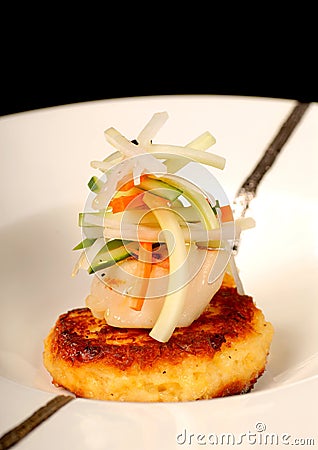 Asian crab cake with scallop and vegetable salad Stock Photo