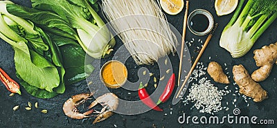 Asian cuisine ingredients over dark slate stone background, top view Stock Photo