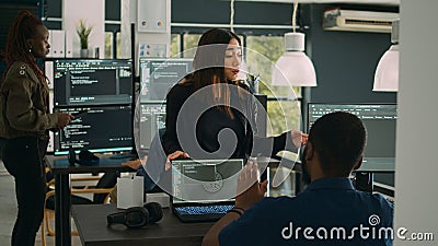 Asian database programer explaining software development Stock Photo