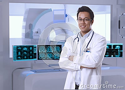 Asian doctor in MRI room at hospital Stock Photo