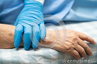 Asian doctor wearing globe to check patient protect safety infection Covid-19 Coronavirus outbreak at quarantine nursing hospital Stock Photo