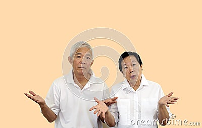 Asian elder old couple unhappy angry with situation copy space Stock Photo