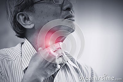 Asian elder old man Sore throat irritation Stock Photo