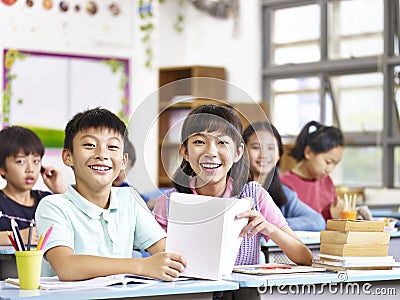 Asian elementary school students in classroom Stock Photo