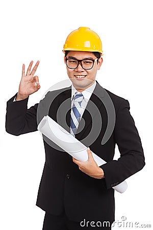 Asian engineer man show OK with blueprints Stock Photo