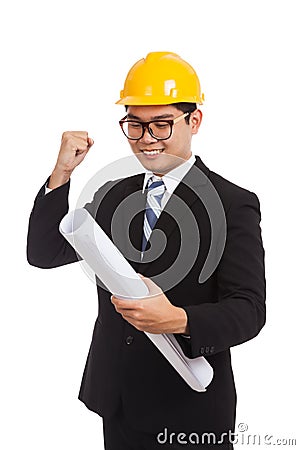 Asian engineer man with success look at blueprints Stock Photo