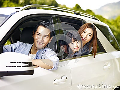 Asian family traveling by car Stock Photo