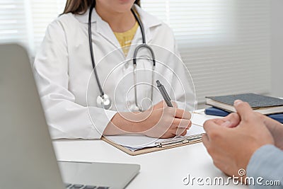 female doctor advice consulting diagnosis and check-up at hospital clinic. Patient explain health problems and symptoms to Stock Photo
