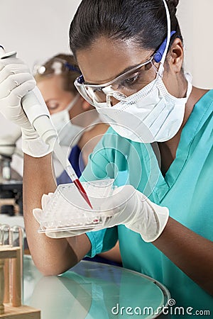 Asian Female Laboratory Scientist & Blood Sample Stock Photo