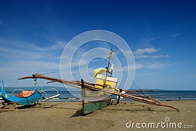 Asian fishermen's boats on beach Stock Photo