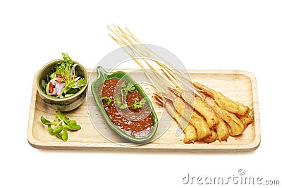 Asian food. Barbecued Shrimp Skewers with Peanut Sauce on isolated white background Stock Photo