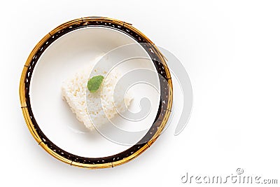 Asian Food concept Thail jasmine rice long grain rice in ceramic and bamboo tray on white background with copy space Stock Photo