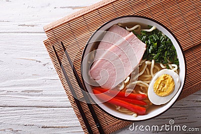 Asian Food: Ramen noodles with pork and egg. horizontal top view Stock Photo