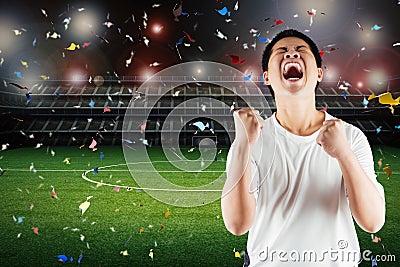 Asian football fan celebrate Stock Photo