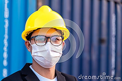 Asian foreman wear masks protect spreading of Covid 19 by wearing face masks Stock Photo