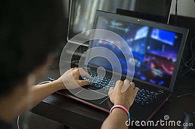 Asian Gamer playing game at home Stock Photo