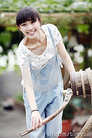 Asian girl enjoying farm life. Stock Photo