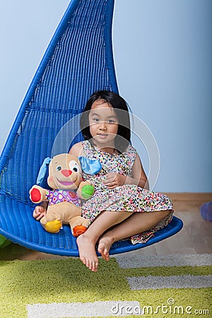 Asian girl with favourite bear Stock Photo