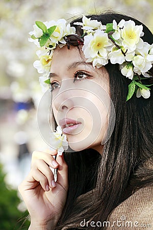 Asian girl with garland Stock Photo