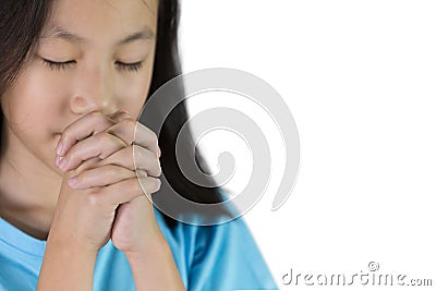 Asian girl hand praying isolated on white background,Hands folded in prayer concept for faith,spirituality and religion Stock Photo