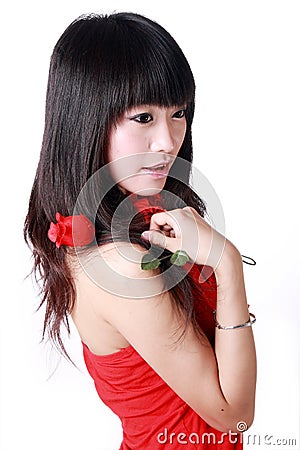 Asian girl holds a rose Stock Photo