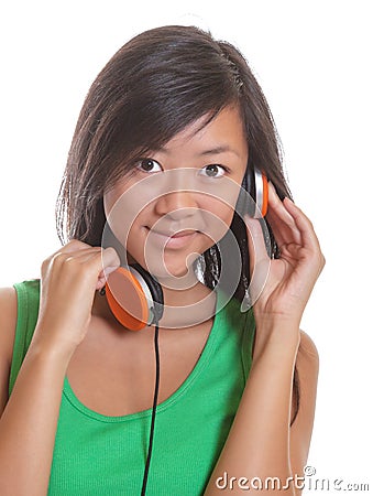 Asian girl listening to the headphone Stock Photo