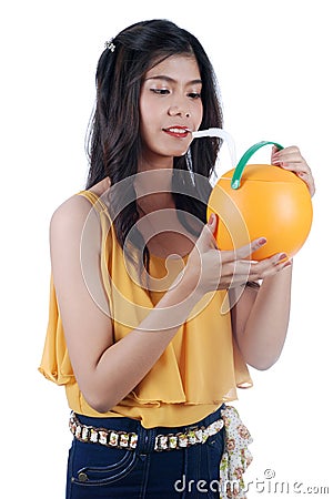 The Asian girl quench thirst. Stock Photo