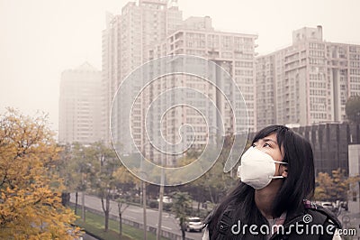 girl in air pollution Stock Photo