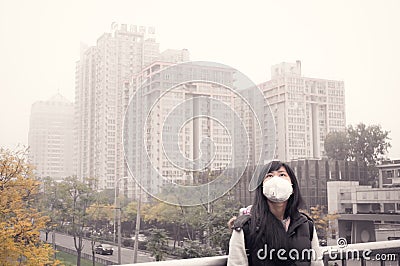 girl in air pollution Stock Photo