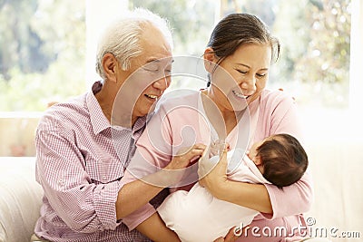 Asian grandparents with baby Stock Photo