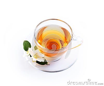 Asian green tea with jasmine flower in transparent teacup isolated on white background with reflection Stock Photo