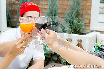 Asian group people drinking at party outdoor. group of friends c Stock Photo