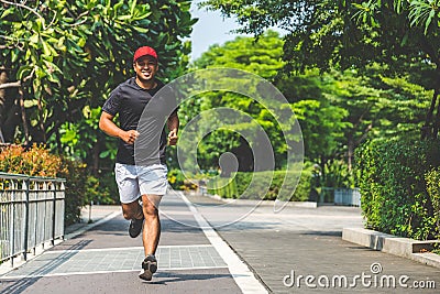 Healthy runner jogging outdoor. Fitness and sport healthy lifestyle concept. Stock Photo