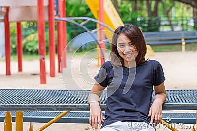 Asian healthy teen wear casual cloth sitting relax happy smile when exercise Stock Photo