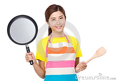 Asian housewife with cooking tool Stock Photo