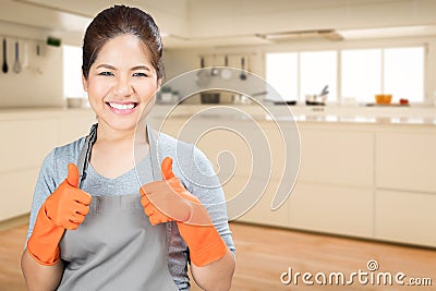 Asian housewife thumbs up Stock Photo