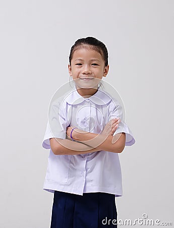 Asian kids cute girl in student's uniform on white background Stock Photo